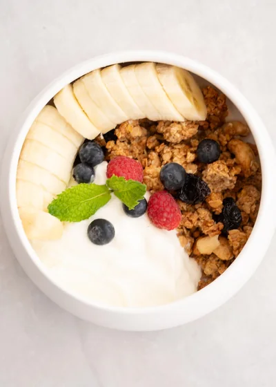 Honey granola, greek yogurt & red berries